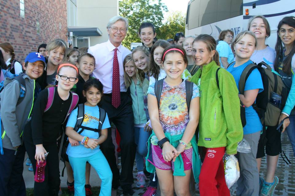 Head of school Walter Sorenson poses with upper elementary students before their fall campout earlier this month: Facebook
