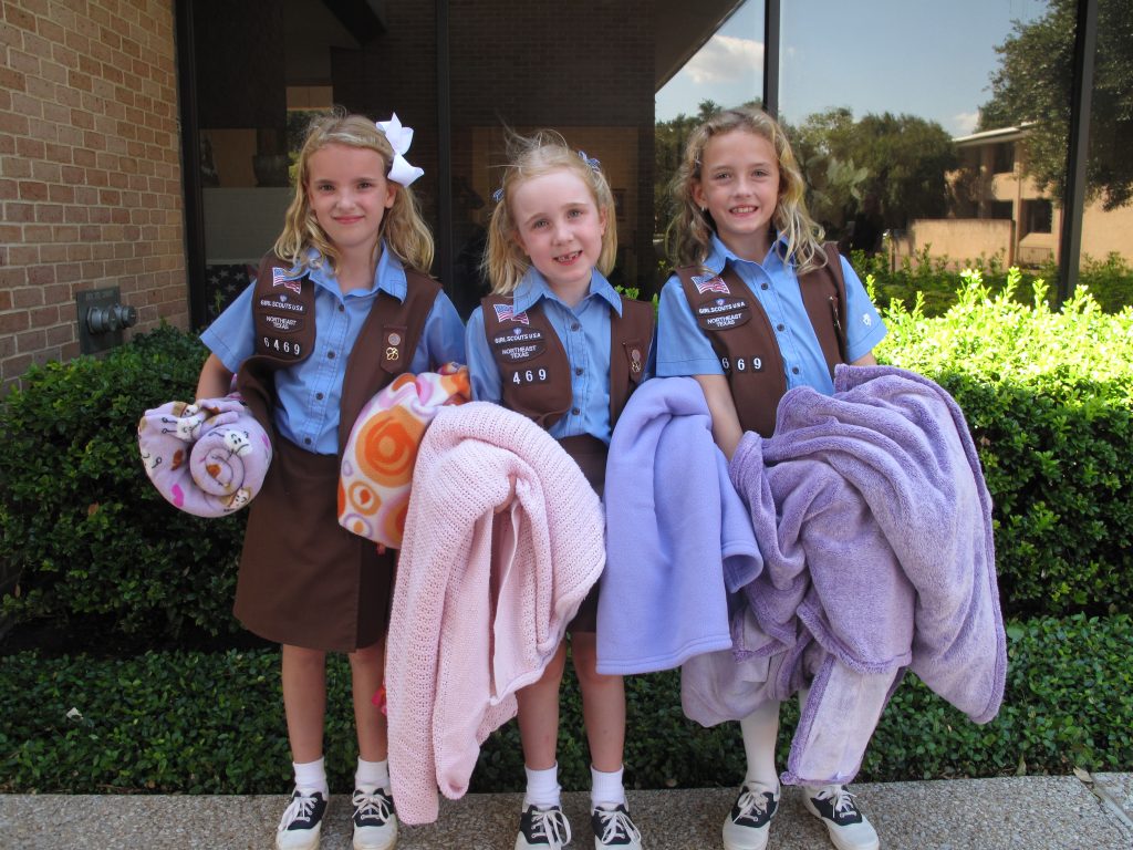 Three Girl Scout Brownies from the Episcopal School of Dallas participated in the Share the Warmth Blanket Drive. 