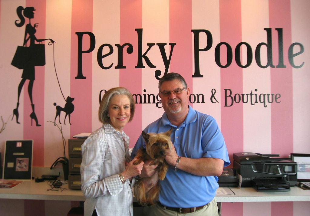 Preston Hollow neighbor Eliza Solender and Perky Poodle owner Michael Pugh with his dog, Tully