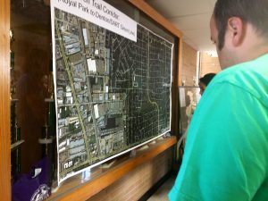 Neighbors examine plans for the Northaven Trail extension: Photo by Valirie Morgan