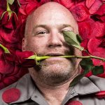 Brent Hurling buried in roses