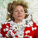Dallas City Councilman Jennifer Staubach Gates buried in packing peanuts