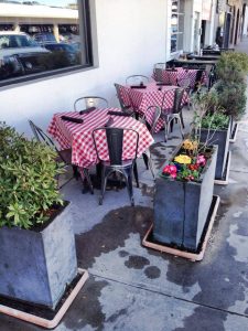 Rathbun's patio, where you can eat seasonal dishes right next to some freshly planted spring flowers