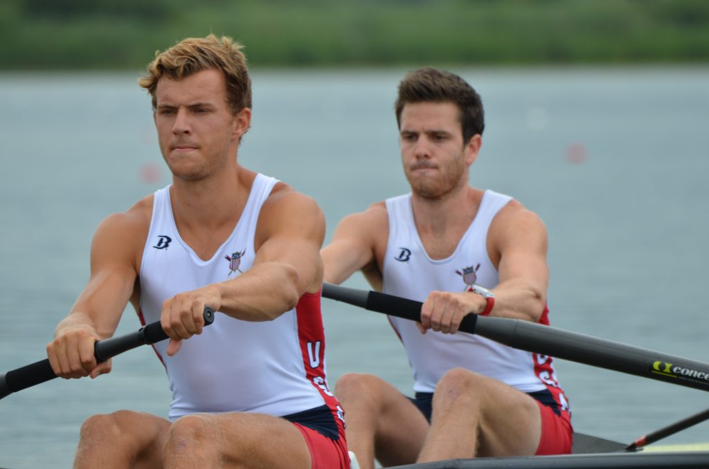 Jesuit alumnus Cole Reiser (background) and his pair partner Jordan Vanderstoeop (foreground) compete in the World Rowing Championships in Varese, Italy (photo via United States Rowing Association Flickr page)