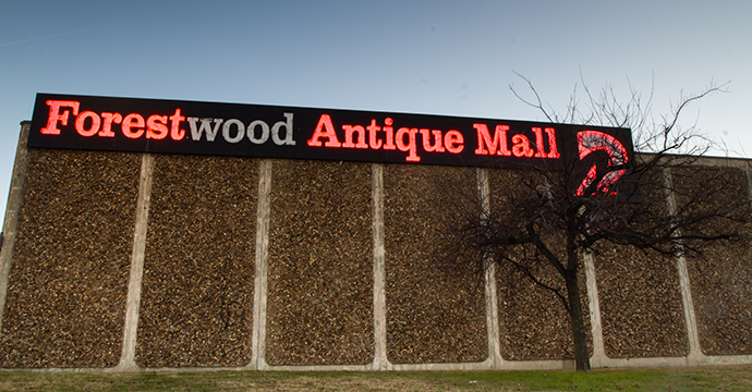 Some say the northeast corner of Forest and Inwood, which includes the Forestwood Antique Mall and other well-known establishments, represents the northern boundary of Preston Hollow. Photo by James Coreas