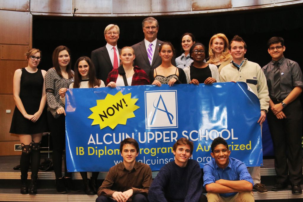 Mayor Mike Rawlings helps Alcuin celebrate becoming an IB World School. 