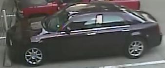 The victim's car, a 2007 burgundy Chrysler 300 four-door, license plate CF2G526, was taken after the shooting. 