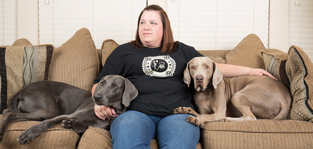 Julie Roller with Earl and her own rescue, Daisy.(Photo by Rasy Ran)